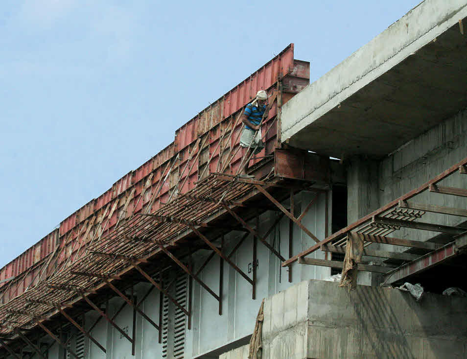 Construction worker on bridge