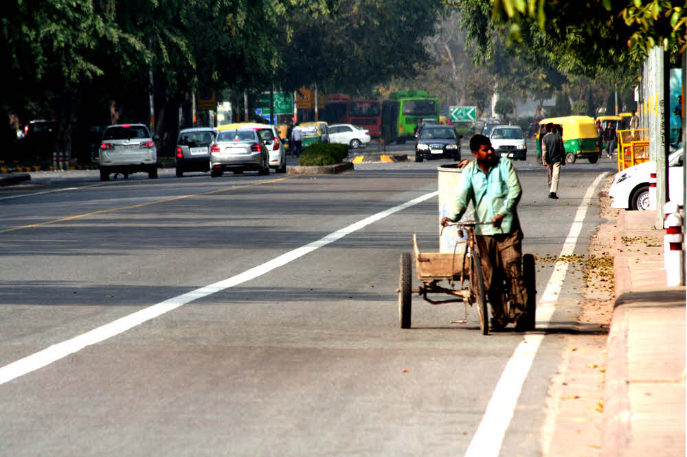 Cart in traffic, India