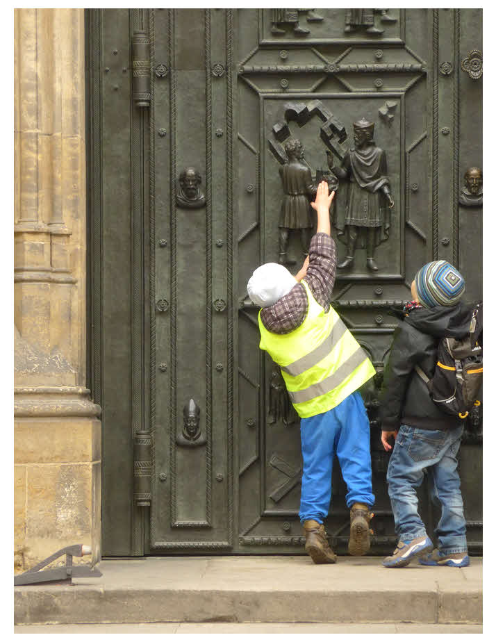 Image: Kids at huge ancient door